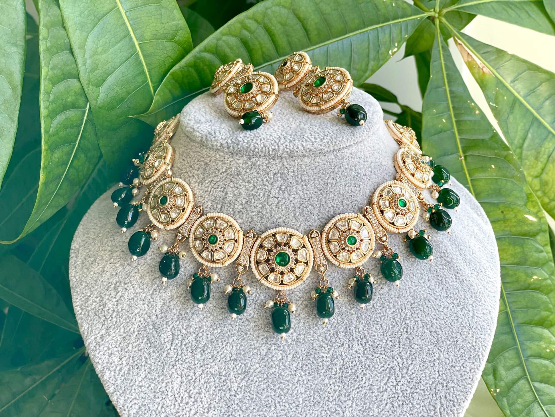 An elegant heavy necklace along with beautiful earrings