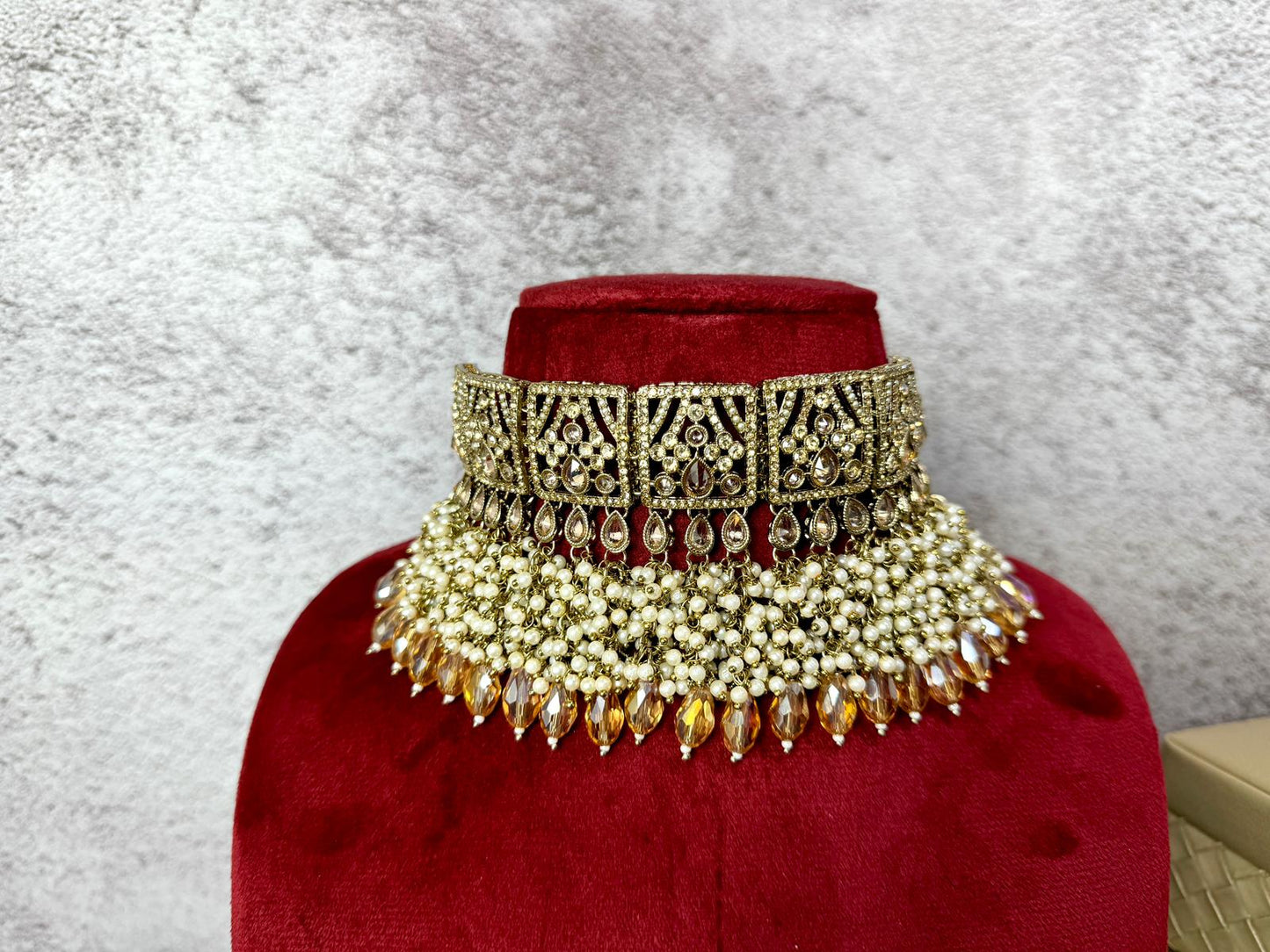 Handcrafted bridal gold set with matching earrings and tikka