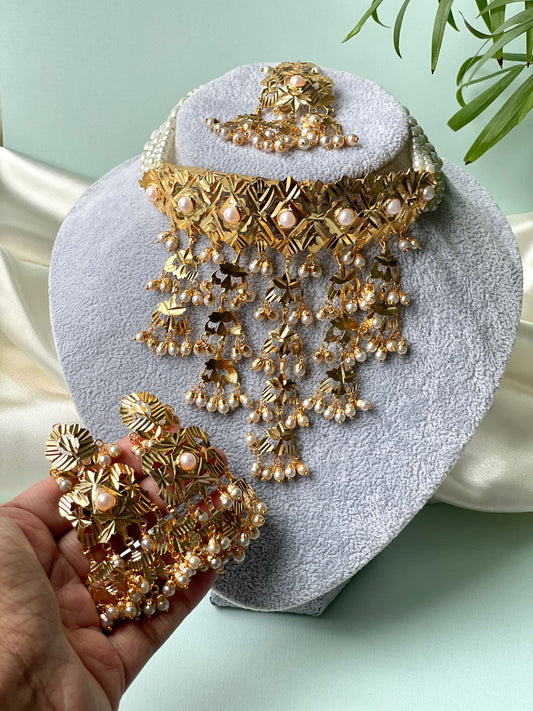 Elegant necklace set with earrings and tikka set
