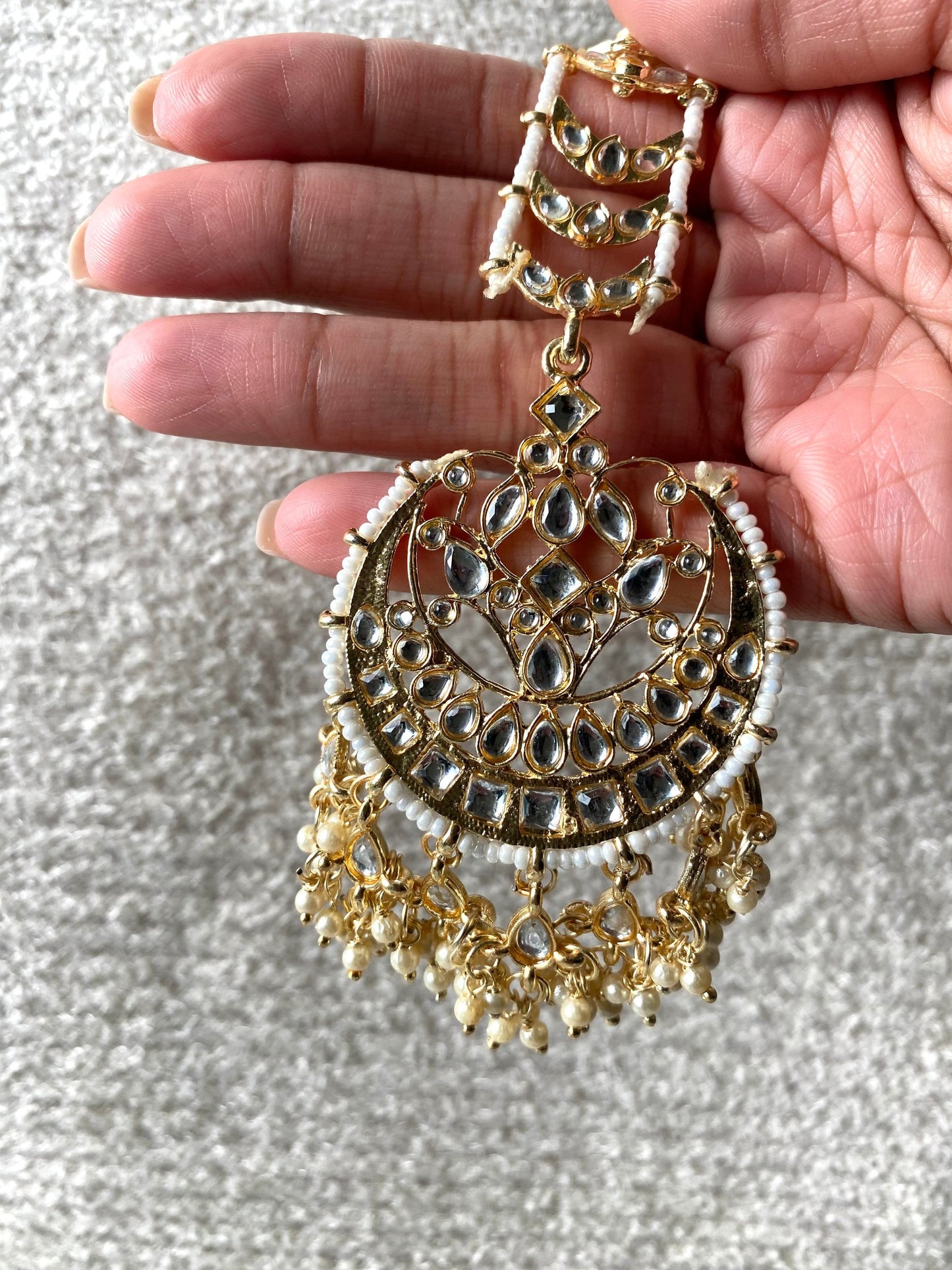 Golden kundan tikka