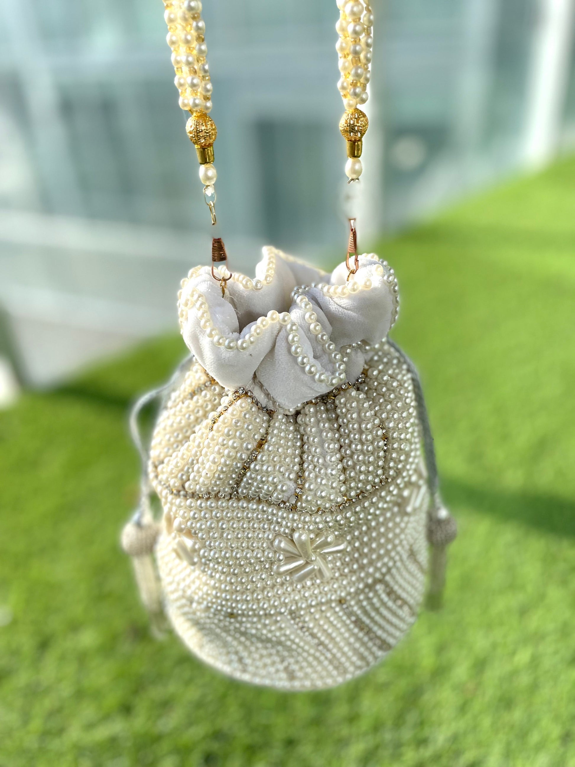 Elegant white potli bag for special occassion