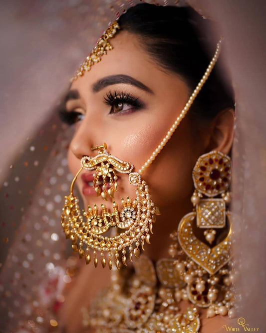 a bride wearing indian jewellery