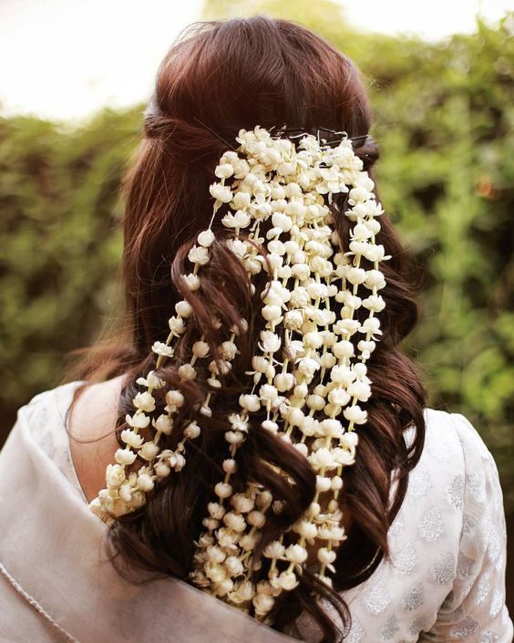 a girl with gajra in her hair