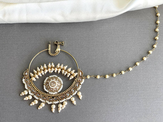 Bridal nose ring with intricate gold design