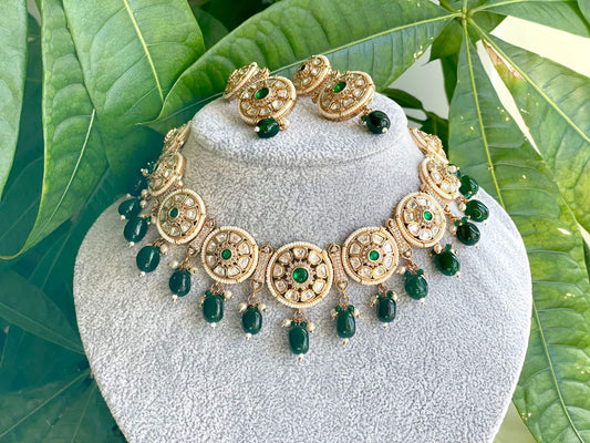 An elegant heavy necklace along with beautiful earrings