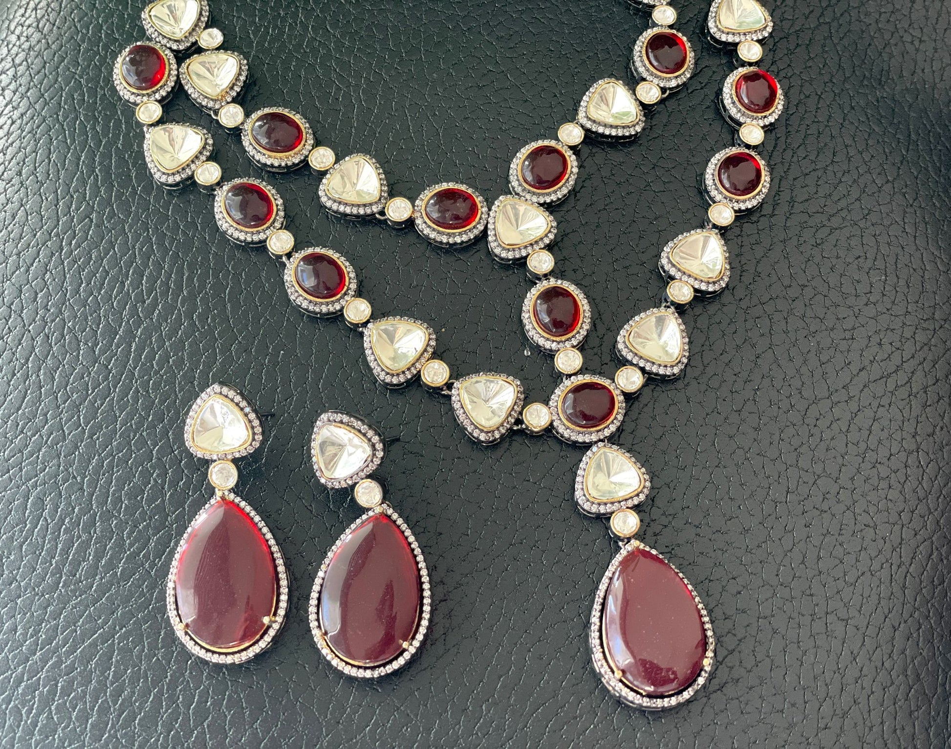 a beautiful necklace set with earrings