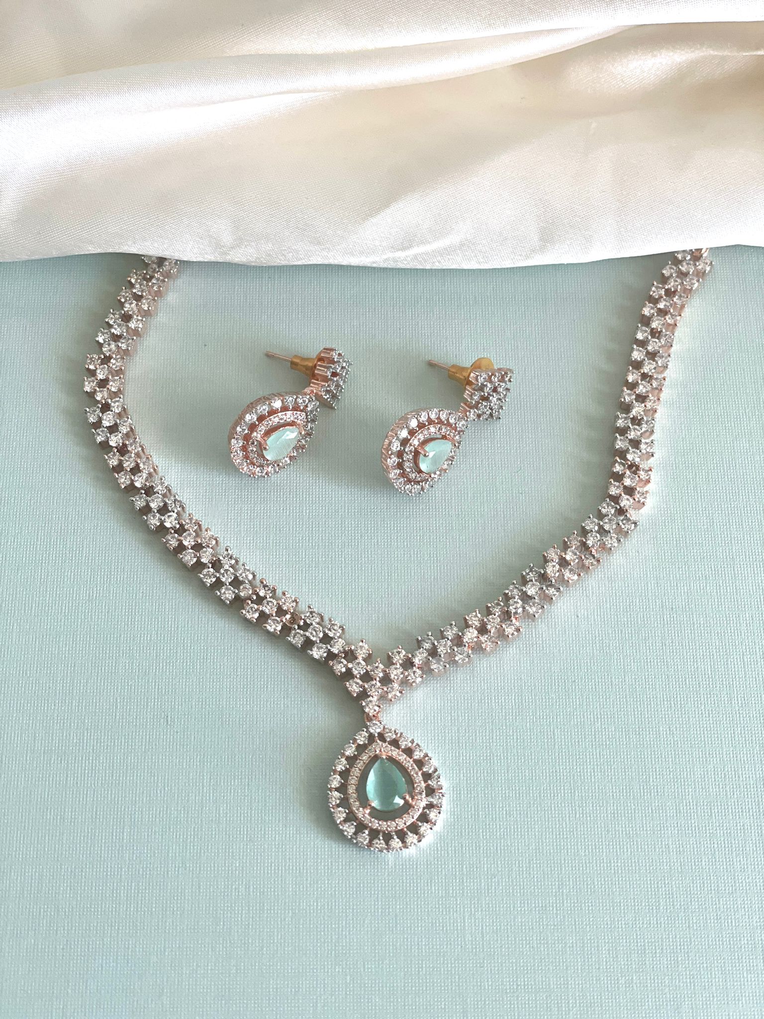 Mint crystal necklace with pair of earrings 