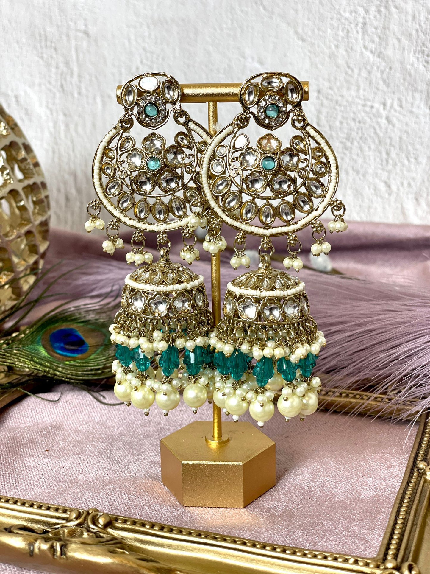 Adorable teal blue jhumka with intricate detailing