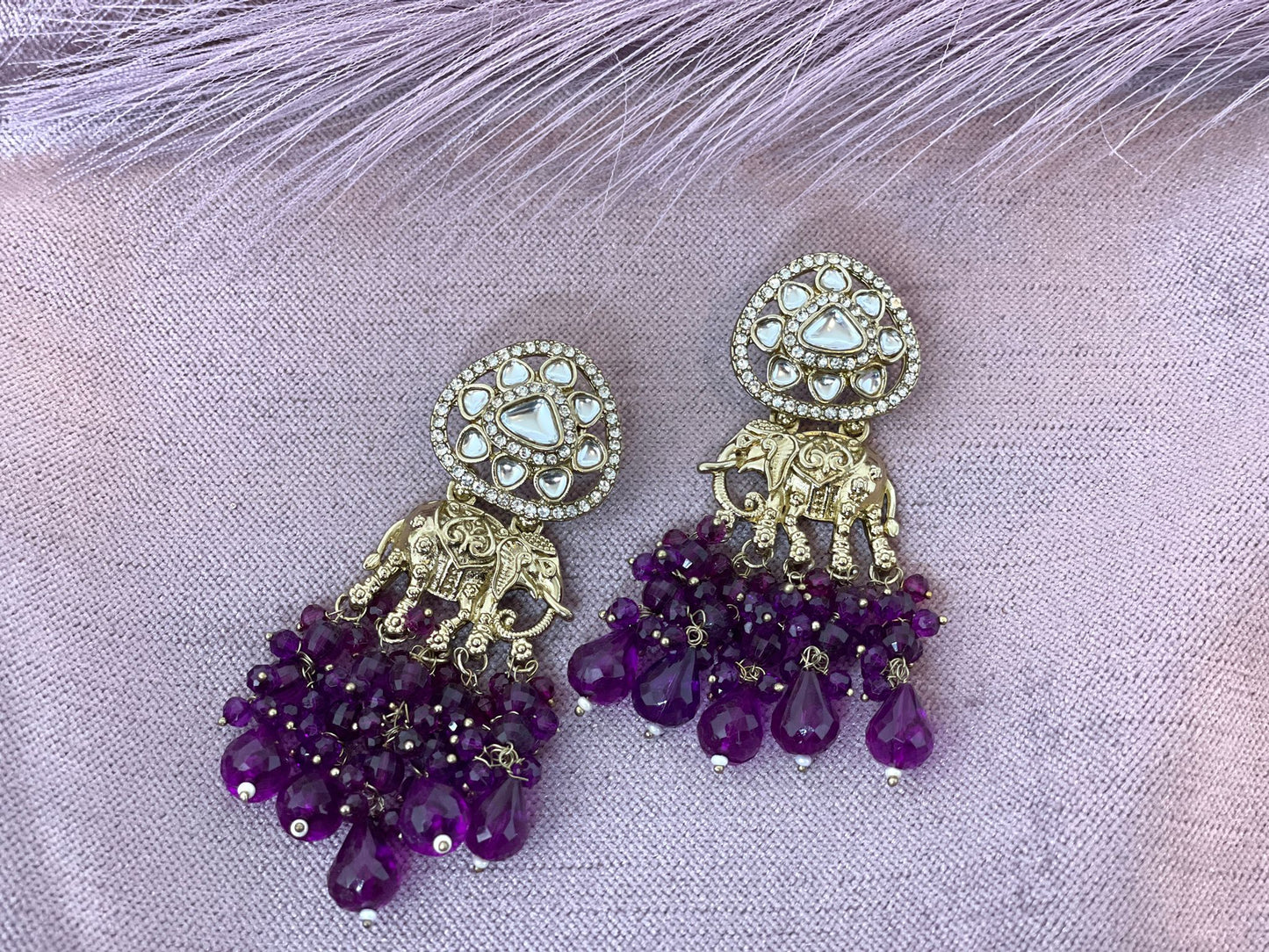 a beautiful dark purple earrings 