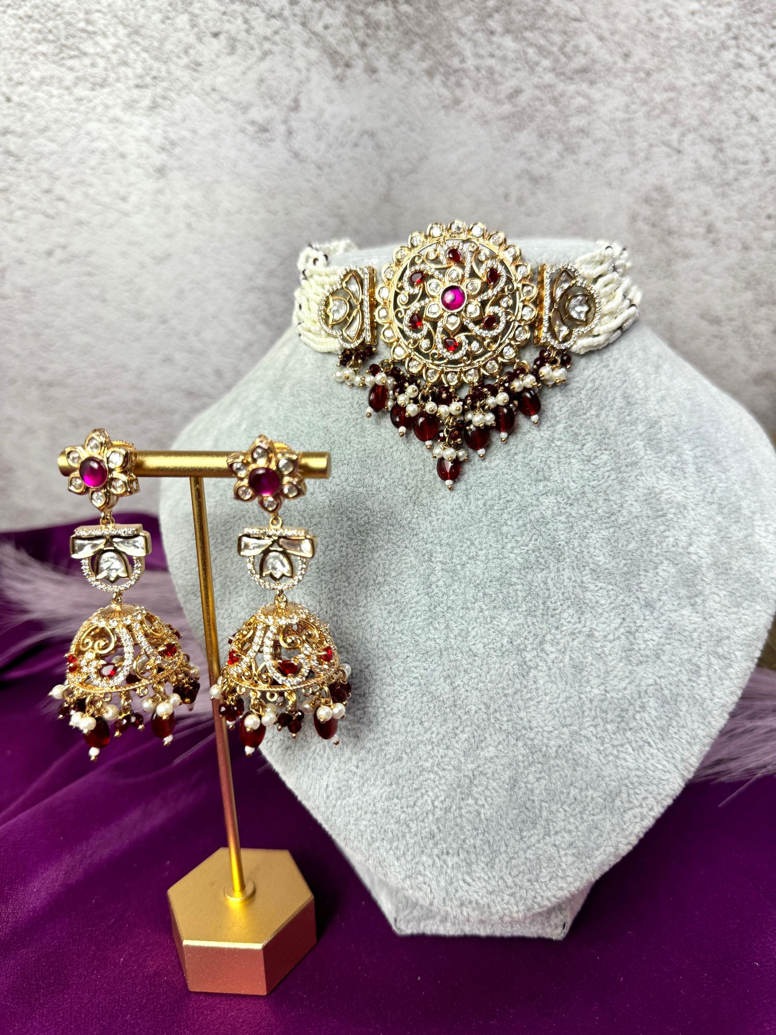 Elegant maroon kundan set with matching earrings