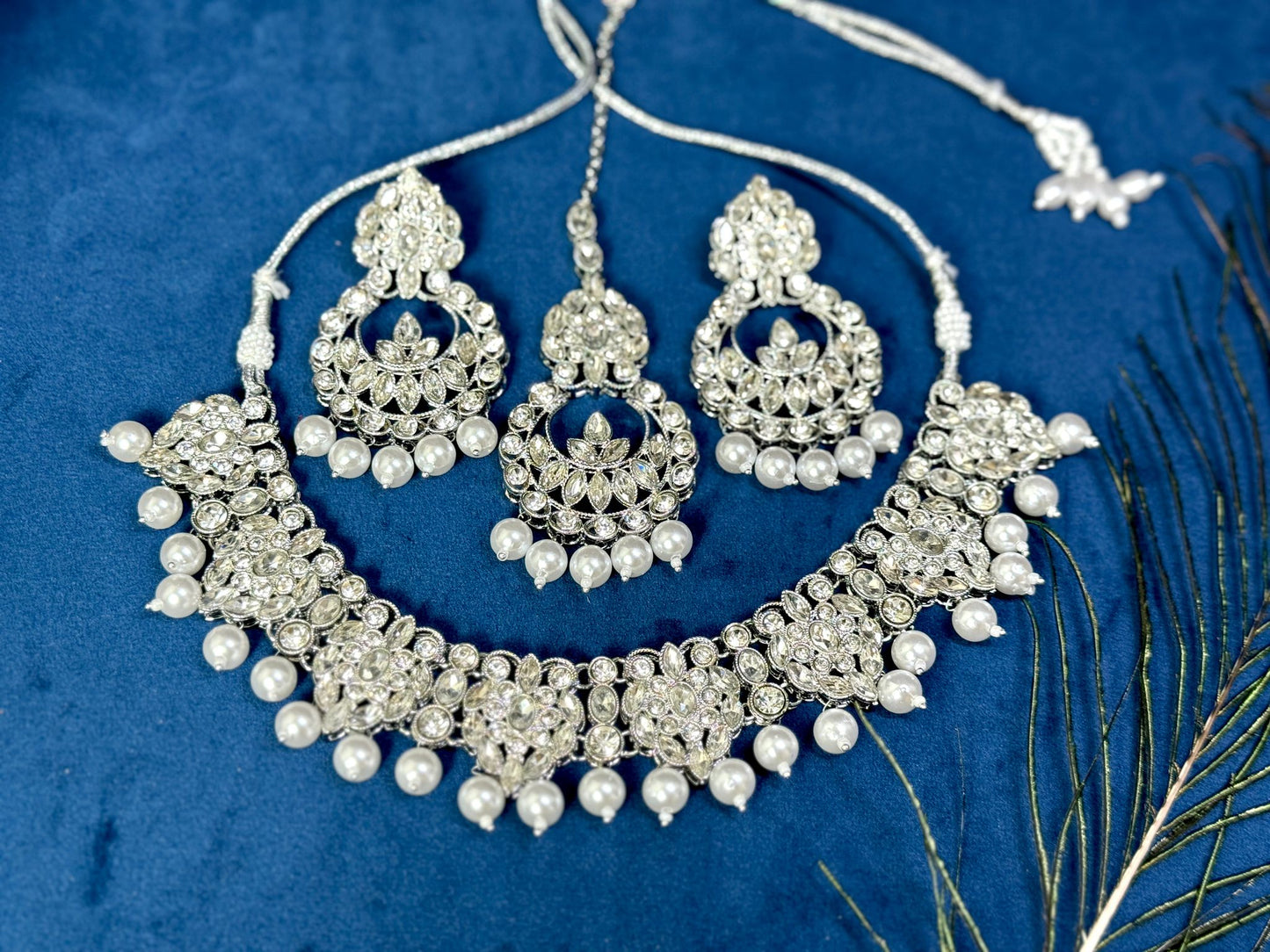 Elegant silver necklace with earrings and tikka set 