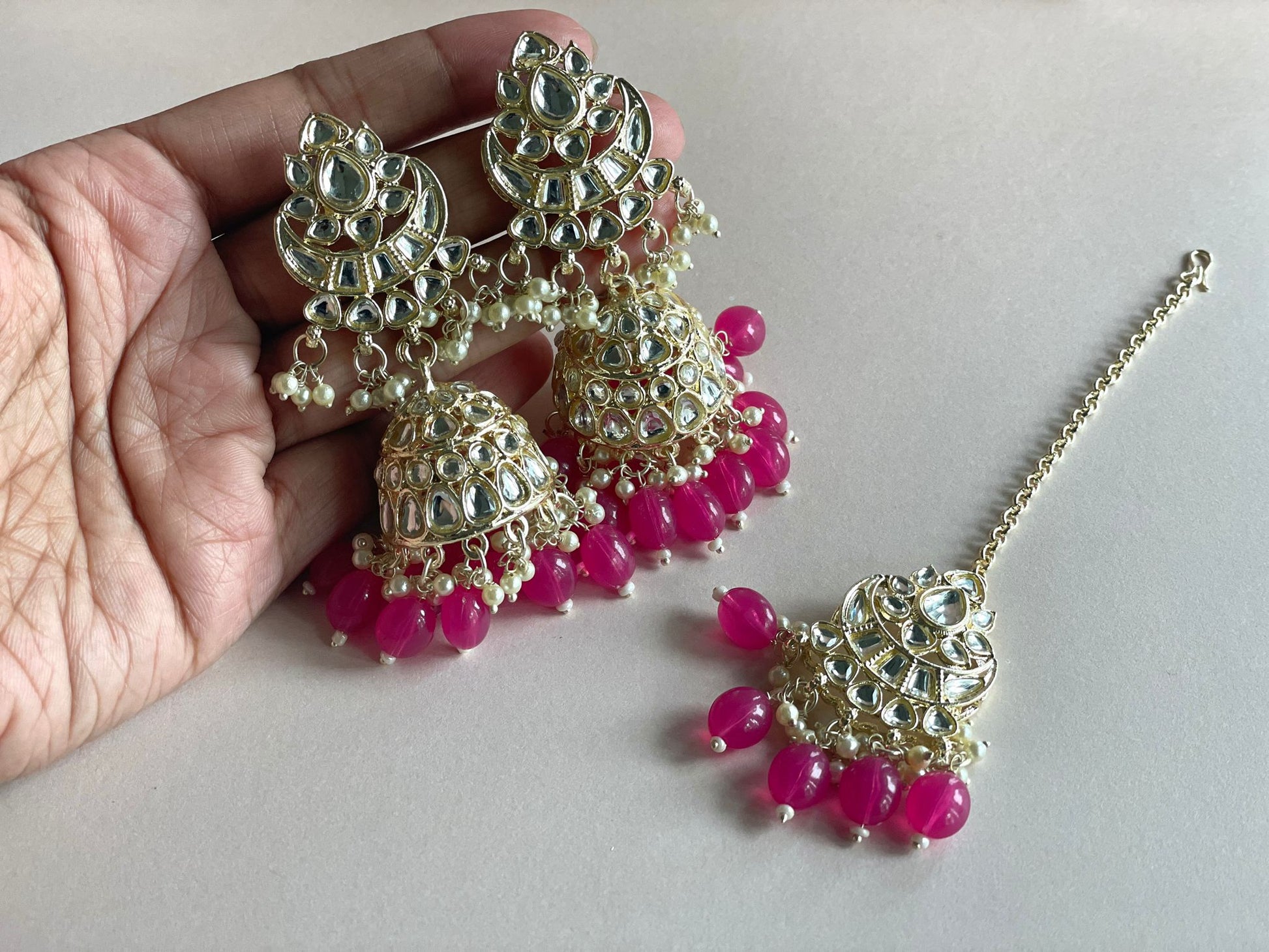 Magenta Tikka Set with intricate design