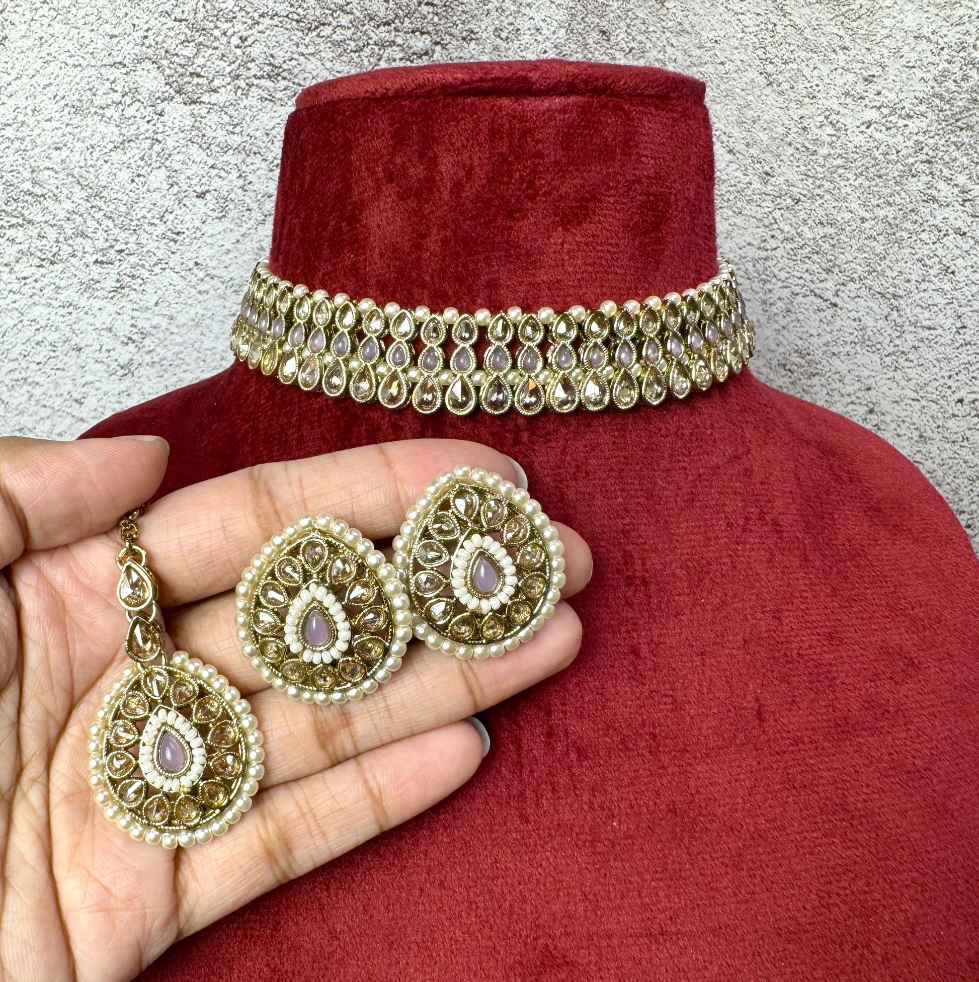 Handcrafted light purple choker with matching earrings and tikka set