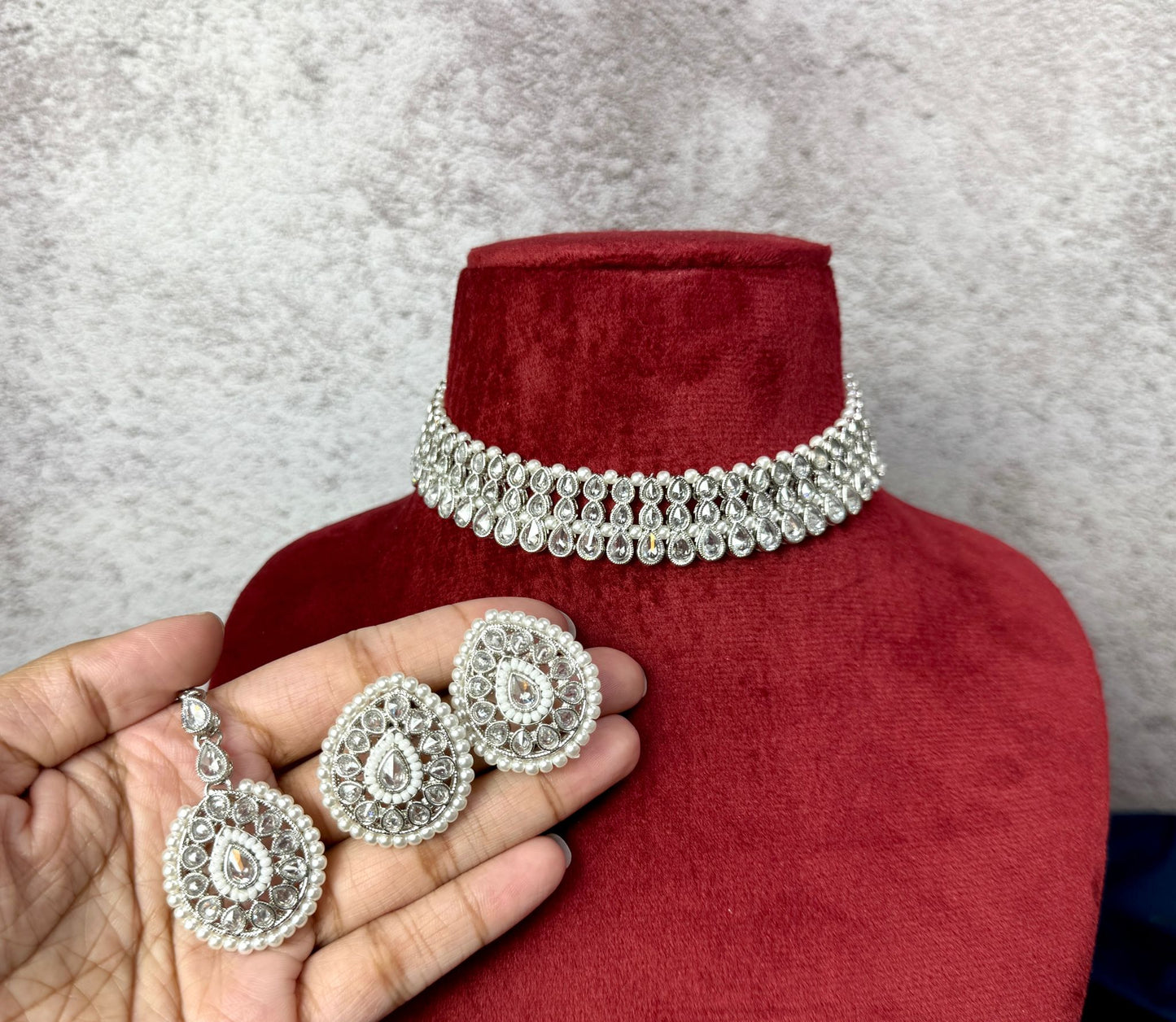 Elegant silver choker with matching earrings and tikka set