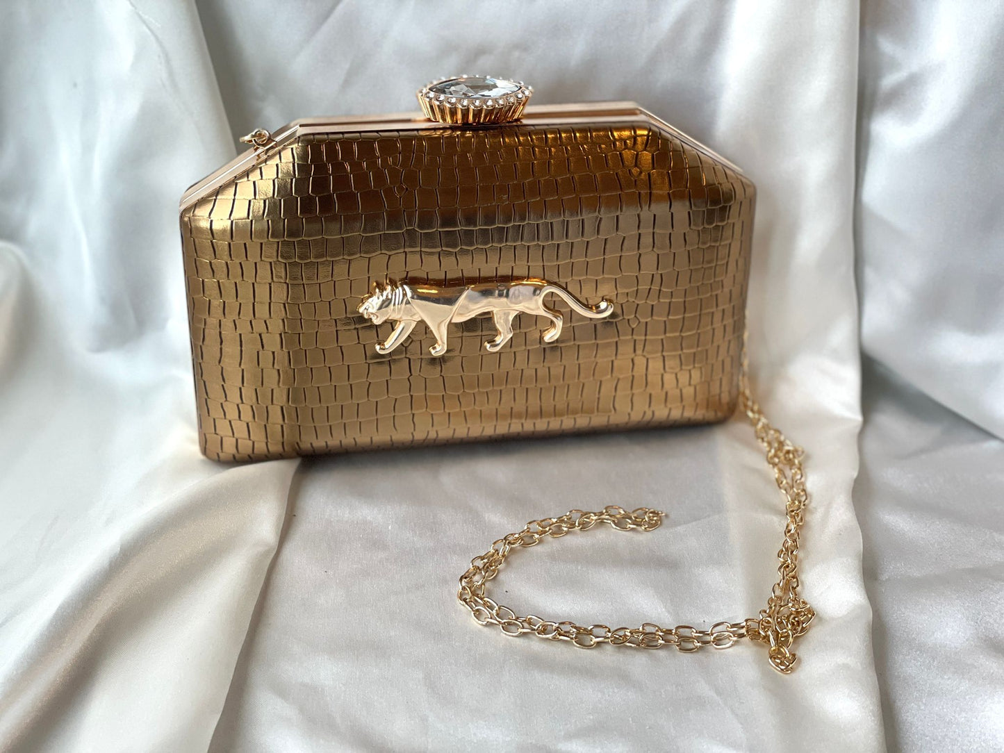 Chic and Stylish Gold Clutch Bag from Sabyasachi